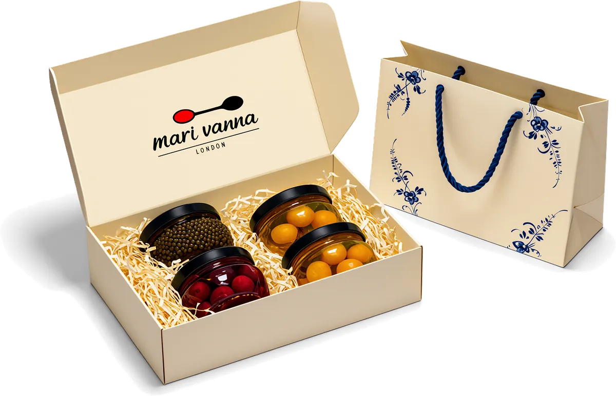 The house gift box lined with straw, a matching cream gift bag and a card